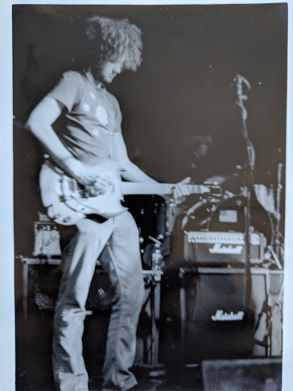 david morrin playing guitar on a stage