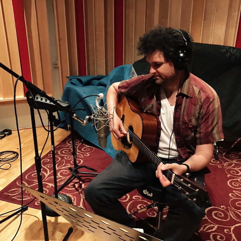 david morrin playing guitar in a studio