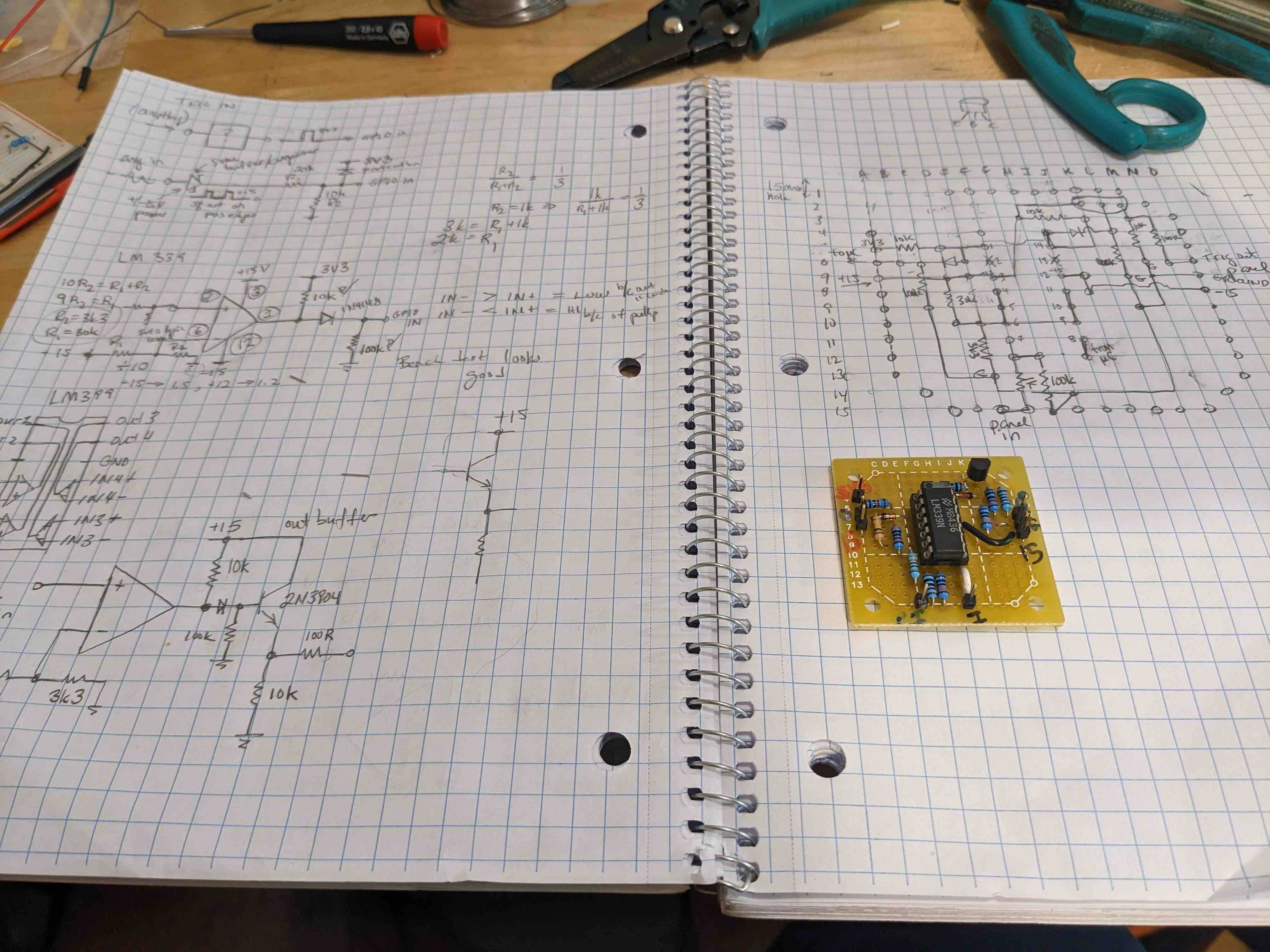 Notebook with circuit design and a hand made circuit