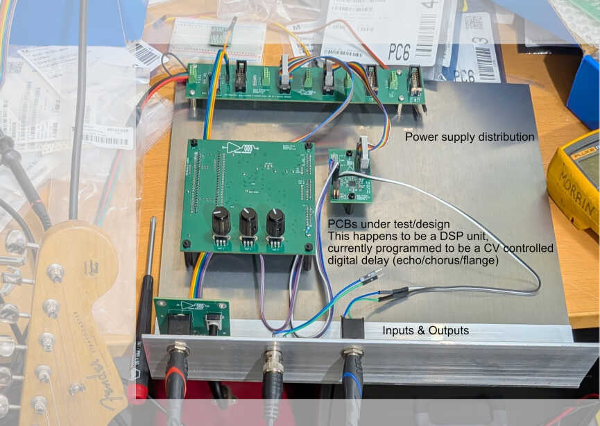 Testing a DSP module on the aluminum breadboard.